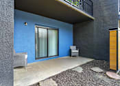 Thumbnail 19 of 39 - Patio of an apartment at Woods of Fairfax, featuring outdoor seating.