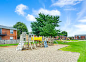 Thumbnail 10 of 17 - Apartment playground at Mount Vernon, featuring play equipment.