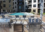 Thumbnail 24 of 41 - Entertainment Deck with Outdoor TV at Quarry at River North Apartments, Indianapolis, 46240