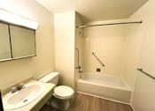 Thumbnail 4 of 17 - Bathroom in a one-bedroom, one-bathroom apartment at Kentwood Square Apartments.