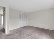 Thumbnail 2 of 17 - Carpeted bedroom in a 1-bed, 1-bath apartment at Mount Vernon.