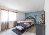 Thumbnail 20 of 23 - Spacious bedroom with a window in the 1 bedroom apartment at Woodbridge Apartments