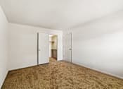 Thumbnail 3 of 24 - Bedroom with closet in a 2-bedroom, 1-bath apartment at Briarwood Apartments, Columbus, IN.