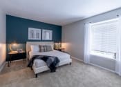 Thumbnail 29 of 63 - Bedroom with a Window at Woodbridge Apartments Bloomington