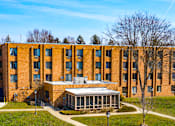 Thumbnail 9 of 13 - Exterior view of Marshall House Apartments.