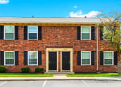 Thumbnail 12 of 18 - Exterior view of Briarwood Apartments in Lafayette, with parking spaces conveniently located in front.