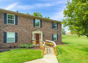 Thumbnail 8 of 13 - Exterior view of Carriage House Apartments in New Albany.