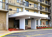 Thumbnail 15 of 17 - Exterior view of the entrance to Kentwood Square Apartments.