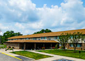 Thumbnail 14 of 15 - Exterior view of a building at Wesley Park Apartments.