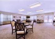 Thumbnail 6 of 16 - Clubhouse at Cambridge Square Apartments in Greenwood, featuring a welcoming interior and comfortable gathering space.