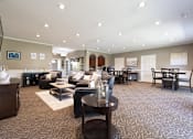 Thumbnail 13 of 27 - Clubhouse interior with ample seating at Archer's Pointe.