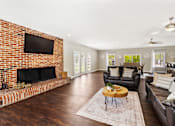 Thumbnail 16 of 24 - Clubhouse lounge at Briarwood Apartments, Columbus, IN.