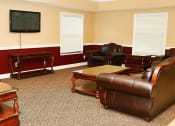 Thumbnail 1 of 18 - Clubhouse with seating and cable tv.