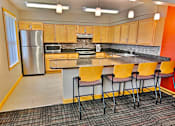 Thumbnail 13 of 16 - Community room kitchen area  at Copper Gate, Lafayette, IN