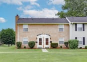 Thumbnail 6 of 16 - Apartment building exterior at Williamsburg on the Lake
