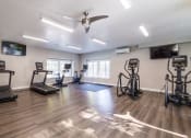 Thumbnail 6 of 63 - Fitness Center at Woodbridge Apartments Bloomington