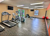 Thumbnail 10 of 16 - Fitness center with exercise equipment  at Copper Gate, Lafayette, 47909