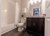 Thumbnail 27 of 63 - Full Bathroom at Woodbridge Apartments Bloomington