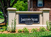 Thumbnail 1 of 9 - A sign that says Jamestown Square in front of a brick building.