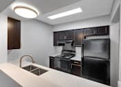 Thumbnail 1 of 19 - Kitchen in a 1-bedroom, 1-bathroom apartment at Briarwood Apartments in Lexington.