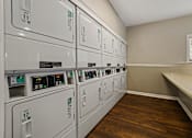 Thumbnail 13 of 24 - On-site laundry facility at Briarwood Apartments, Columbus, IN.