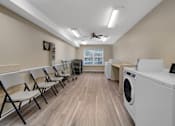 Thumbnail 18 of 19 - Laundry facility at Briarwood Apartments in Lexington.
