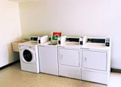 Thumbnail 2 of 13 - Laundry facility at Marshall House Apartments.