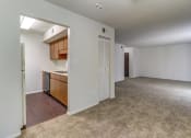 Thumbnail 14 of 21 - Open living and dining area at Ashley Pointe Apartments