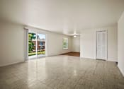 Thumbnail 5 of 15 - Living and dining room area in a 2-bedroom, 1-bath apartment at Cambridge Square Apartments in Flint, featuring an open layout with ample space and natural light.