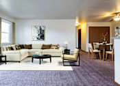 Thumbnail 3 of 16 - Open-concept living and dining room at Copper Gate, Lafayette, IN, 47909