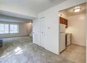 Thumbnail 21 of 25 - Townhome Open Living and Dining Room at The Woods of Eagle Creek