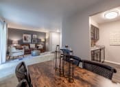 Thumbnail 26 of 63 - Living and Dining Room at Woodbridge Apartments Bloomington