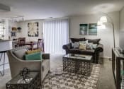 Thumbnail 7 of 19 - Living Room with Sliding Glass Door to Patio or Balcony at Ashmore Trace