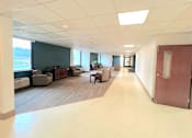 Thumbnail 13 of 17 - Lobby lounge with seating at Kentwood Square Apartments.