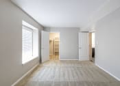 Thumbnail 33 of 63 - A Bright, Naturally Lit Master Bedroom in the One-Bedroom Apartment with Loft at Woodbridge Apartments Bloomington