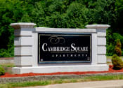 Thumbnail 16 of 16 - Monument sign for Cambridge Square Apartments in Greenwood, displaying the community name.