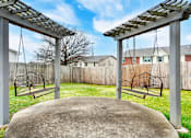 Thumbnail 14 of 19 - Patio swings at Briarwood Apartments in Lexington.