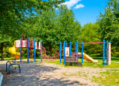 Thumbnail 1 of 16 - Playground at Cambridge Square Apartments in Greenwood.