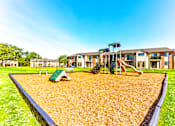 Thumbnail 17 of 18 - Playground with sandbox at Thompson Village Apartments, Indianapolis, IN