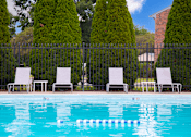 Thumbnail 19 of 24 - Swimming pool at Briarwood Apartments, Columbus, IN, offering a relaxing outdoor space for residents.