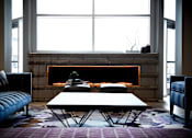 Thumbnail 28 of 41 - Legacy Living Room Fireplace and Seating Area at Quarry at River North Apartments, Indianapolis, IN 46240