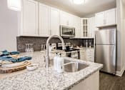 Thumbnail 1 of 41 - Marble Style Floorplan Kitchen at Quarry at River North Apartments, Indiana 46240