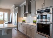 Thumbnail 13 of 41 - Luxury Penthouse Kitchen at Quarry at River North Apartments, Indiana
