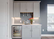 Thumbnail 16 of 41 - Luxury Penthouse Features Built-In Wine Cabinet at Quarry at River North Apartments, Indiana 46240