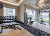 Thumbnail 31 of 41 - Wellness Center Free Weights and Strength Conditioning Machines at Quarry at River North Apartments, Indianapolis