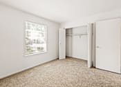 Thumbnail 7 of 24 - Secondary bedroom with closet in a 2-bedroom, 1-bath apartment at Briarwood Apartments, Columbus, IN.