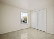 Thumbnail 4 of 15 - Secondary bedroom with a  closet in a 2-bedroom, 1-bath apartment at Cambridge Square Apartments in Flint.