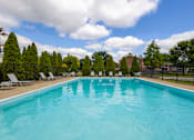 Thumbnail 20 of 24 - Swimming pool at Briarwood Apartments, Columbus, IN, offering a relaxing outdoor space for residents.