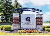 Thumbnail 26 of 27 - A sign for Westhaven Luxury Apartment Homes is displayed in front of a grassy area.