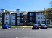 Thumbnail 37 of 39 - Apartment building exterior at Woods of Fairfax